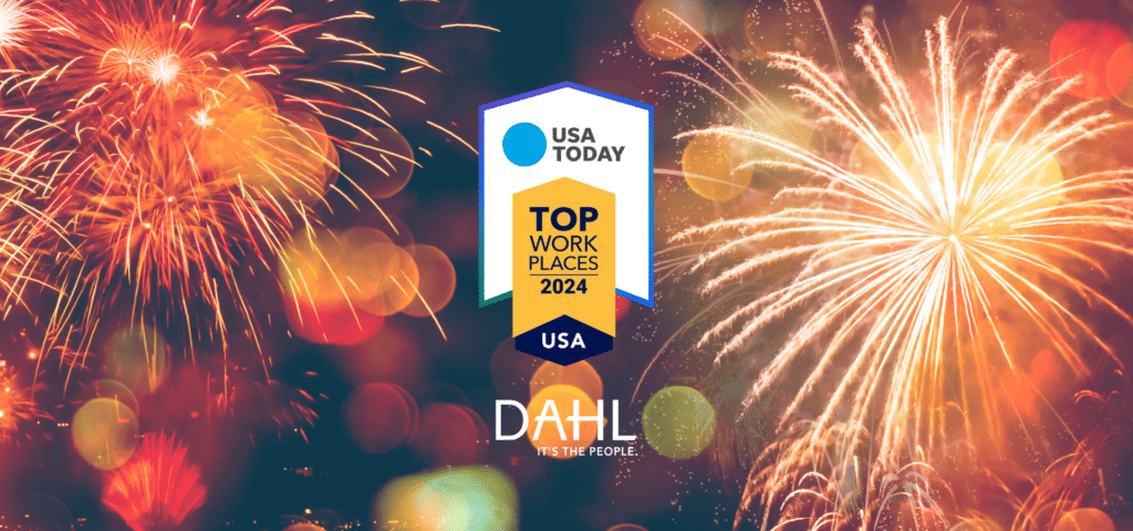 Top Workplaces USA logo and DAHL logo on red firework background