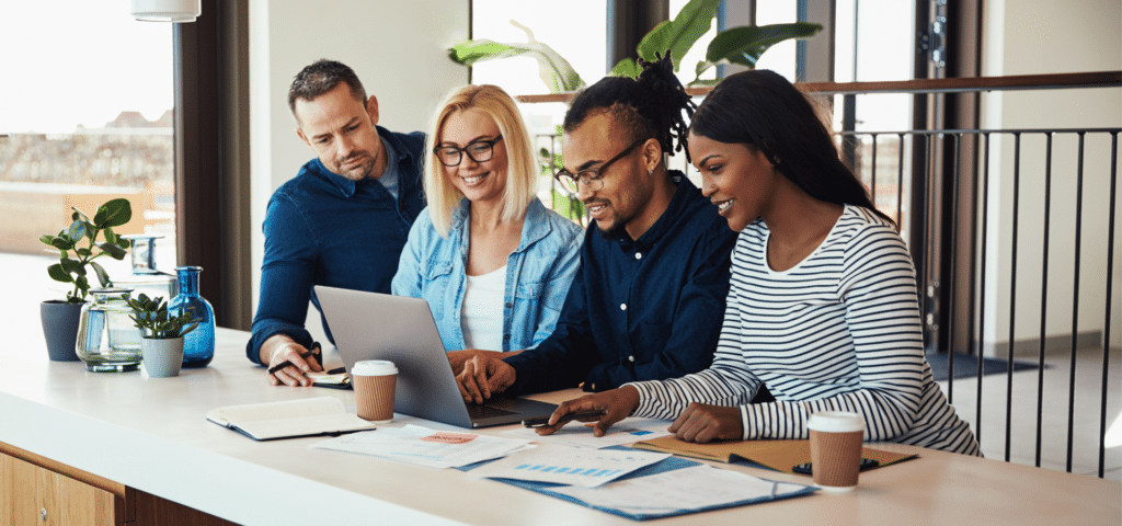 group of employees working together at a counter